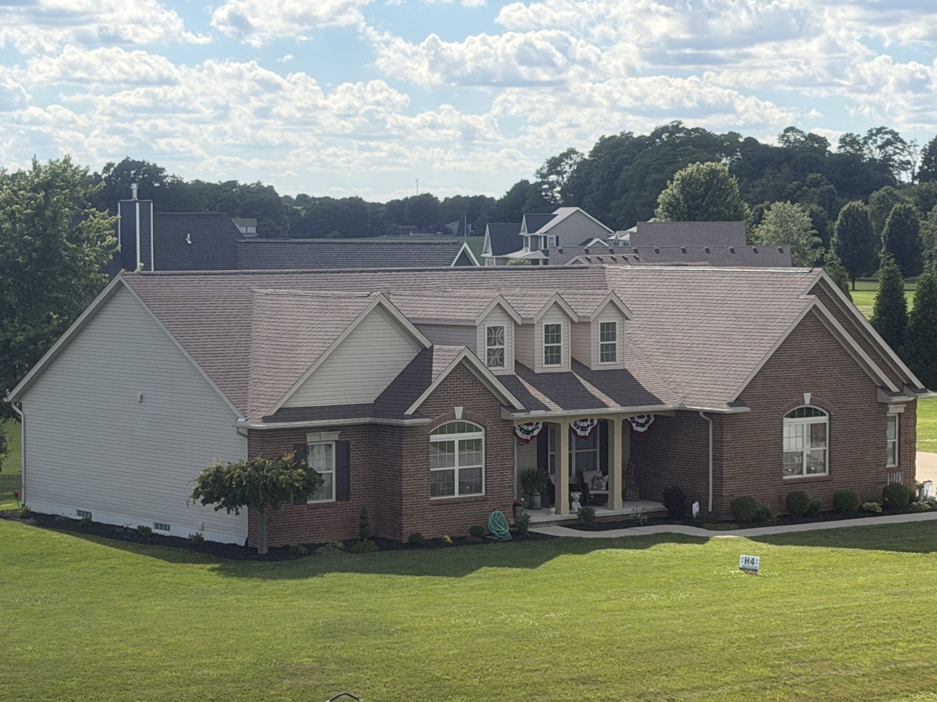 Aerial view of a completed standing seam metal roof installed near Dayton, Ohio